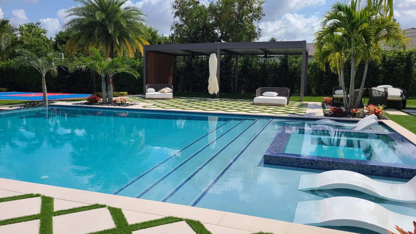 Custom pool and patio project by Cliff's Pools & Patios for Loxahatchee, FL homeowners