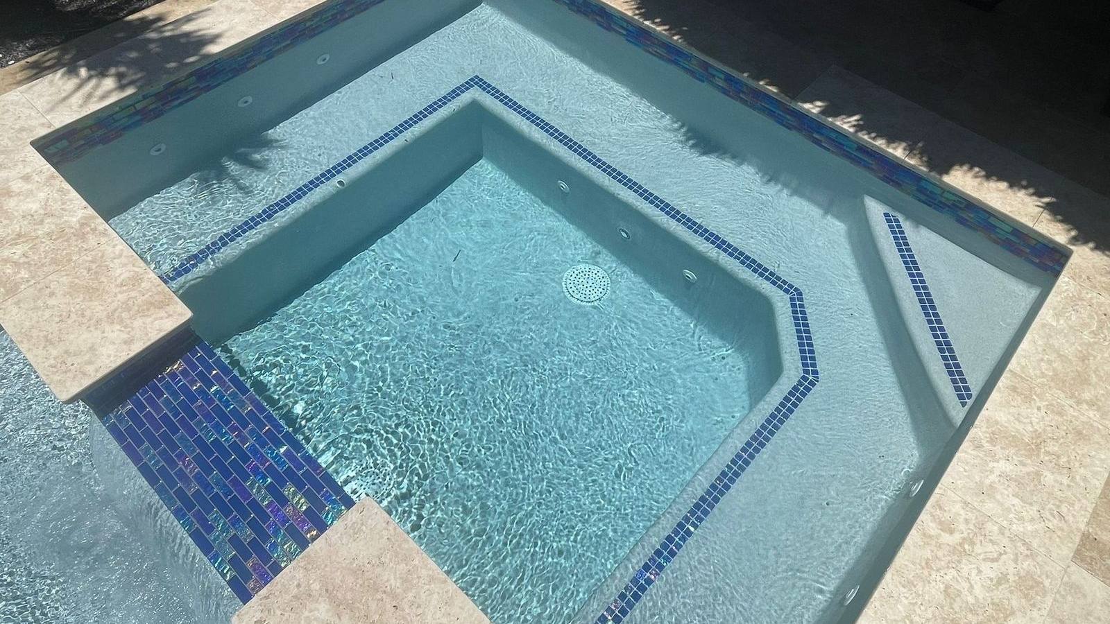 Custom pool and patio project by Cliff's Pools & Patios for Westlake, FL homeowners