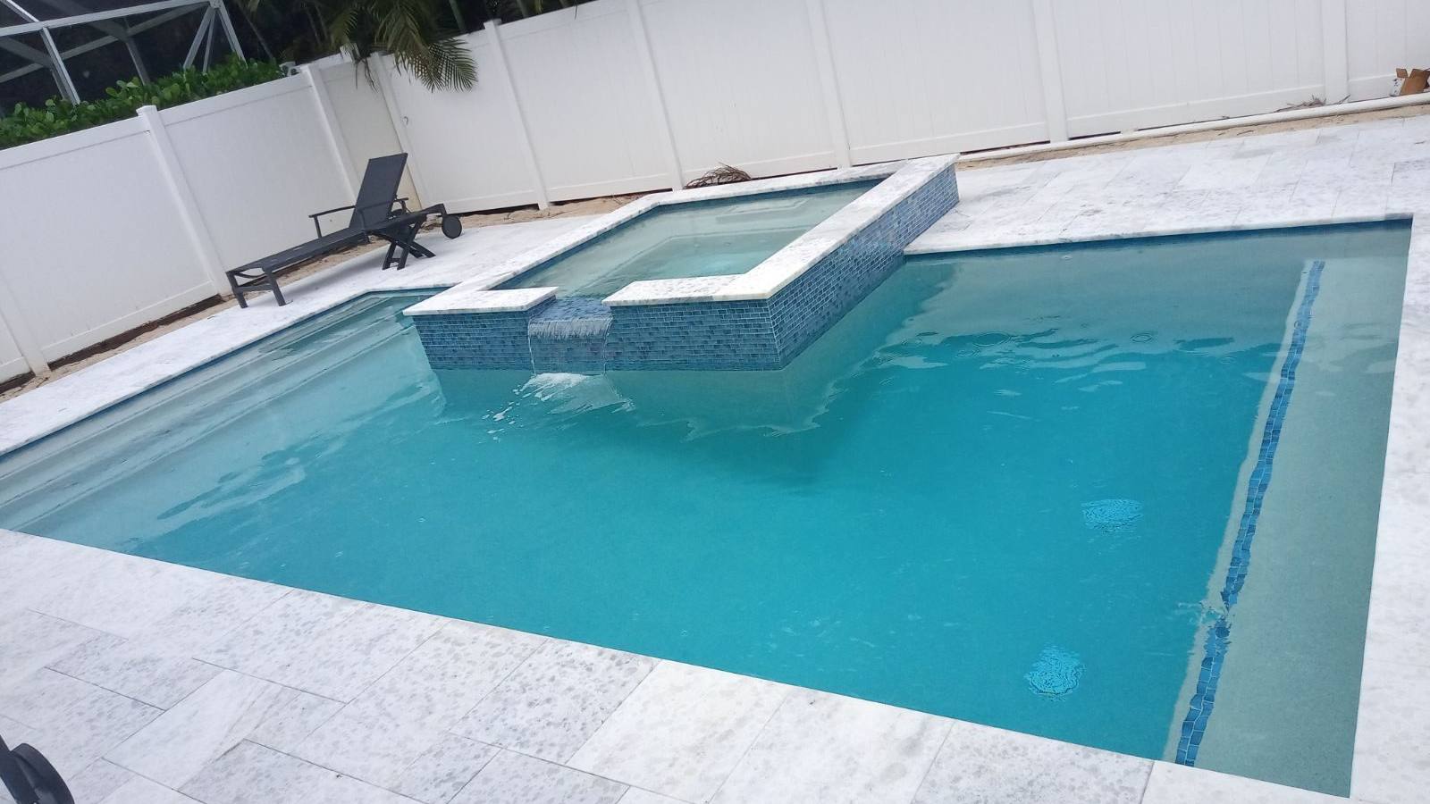 Custom pool and patio project by Cliff's Pools & Patios for Palm Beach Gardens, FL homeowners