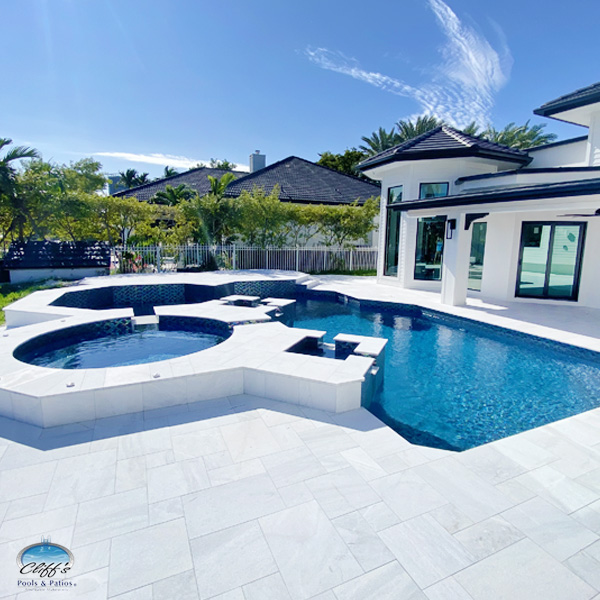 Modern Cliff's custom pool with sleek waterline tile