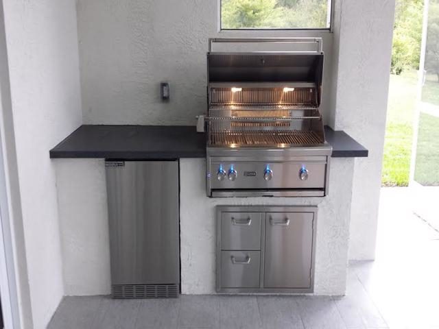 Cliff's Pools & Patios modern stainless outdoor kitchen with dark counter