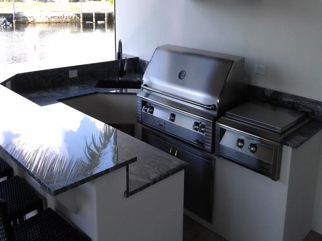 Cliff's Pools & Patios modern outdoor kitchen with black granite - serving Davie, FL