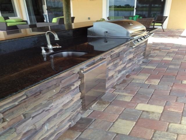 Cliff's Pools & Patios long dark granite outdoor kitchen bar - serving Coral Springs, FL