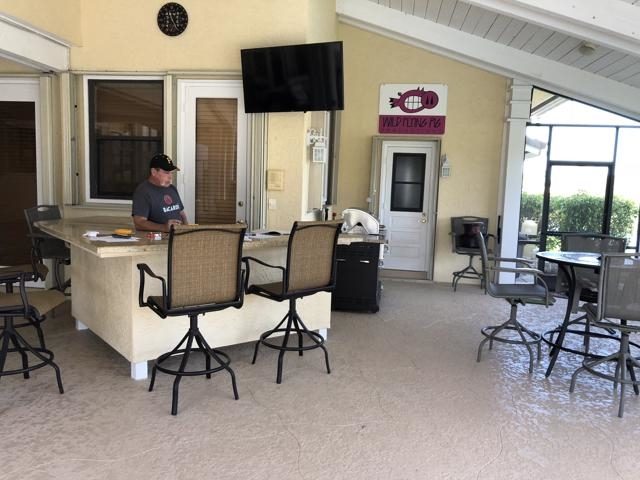 Cliff's Pools & Patios modern outdoor kitchen with bar seating - serving Haverhill, FL