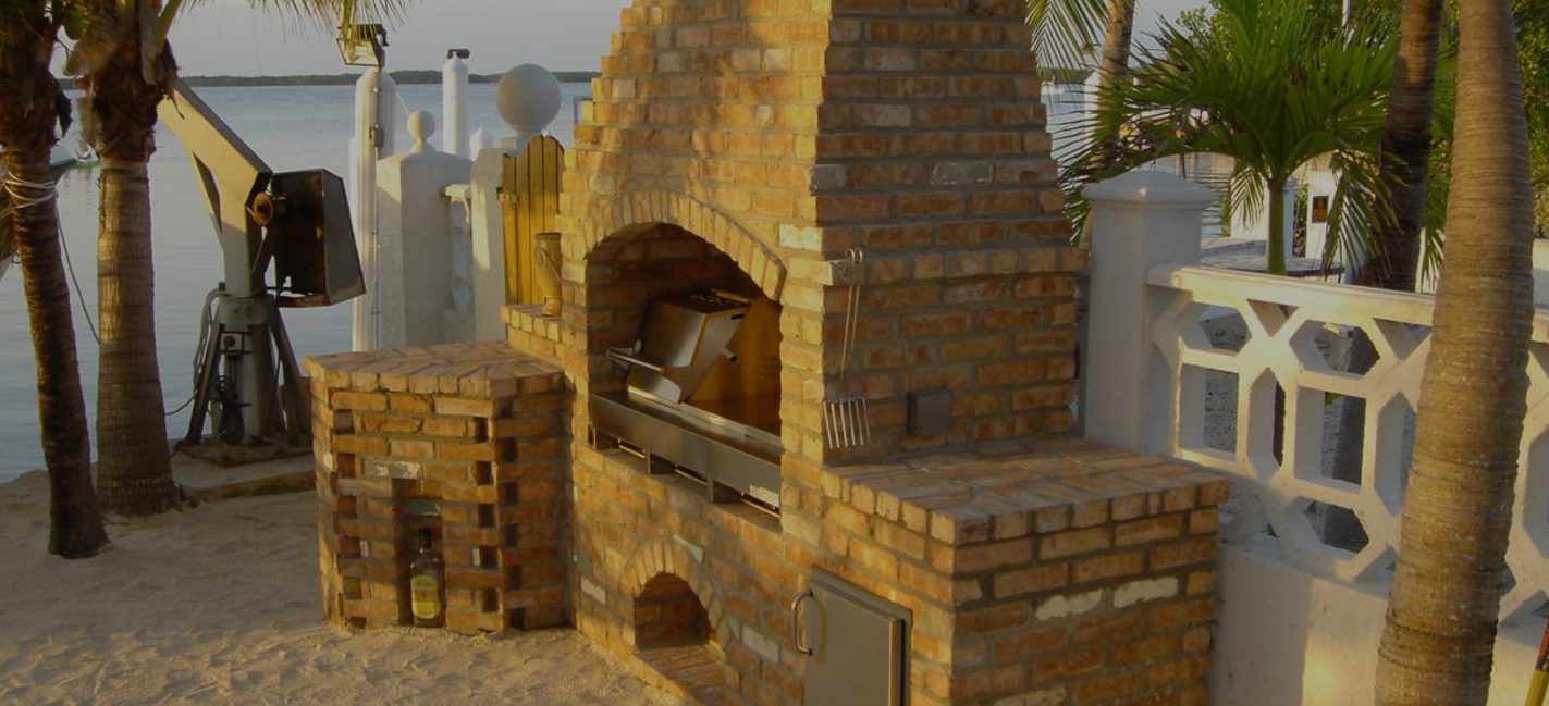 Cliff's Pools & Patios brick outdoor kitchen with wood-fired pizza oven - serving Pembroke Pines, FL