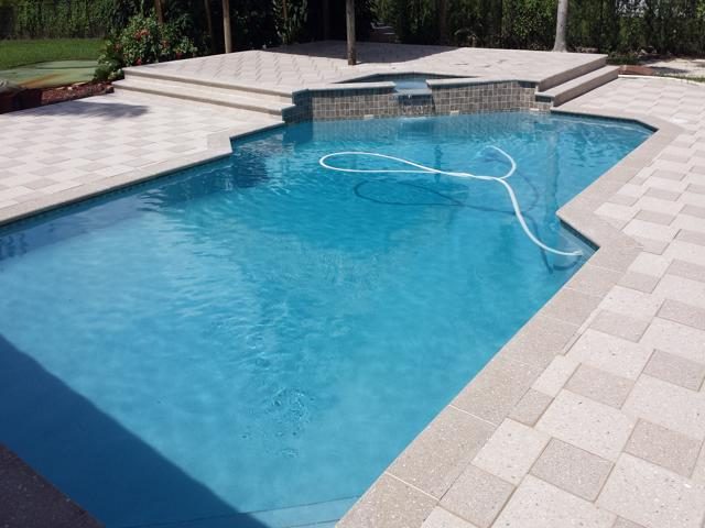 Cliff's Pools & Patios paver pool deck and patio