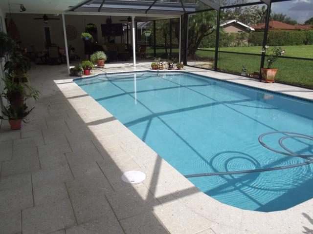 Cliff's Pools & Patios paver pool deck and patio