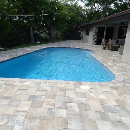 Traditional pavers around a luxury pool by Cliff's Pool in South Florida